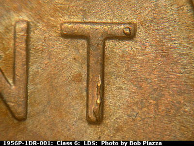 Die-stage C marker on 1956P•1DR•001 (1956 Doubled Die Reverse).