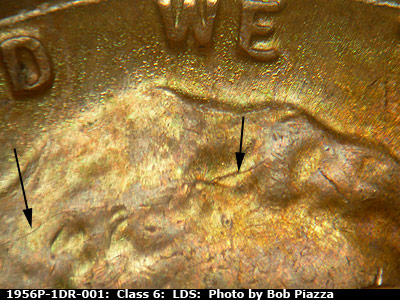 Die-stage C marker on 1956P•1DR•001 (1956 Doubled Die Reverse).