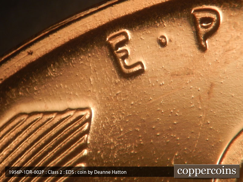 Die-stage A marker on 1956P•1DR•002P (1956 Doubled Die Reverse).