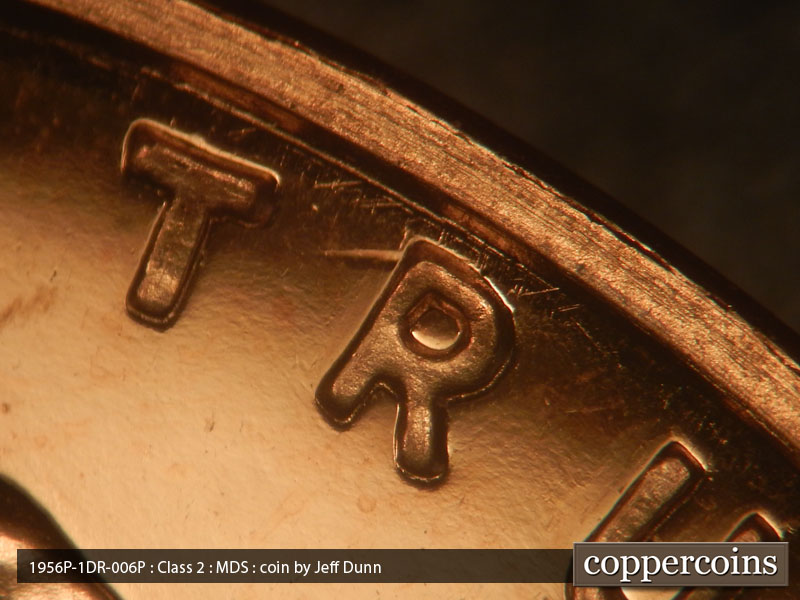 Die-stage B marker on 1956P•1DR•006P (1956 Doubled Die Reverse).
