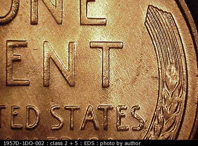 Die-stage A marker on 1957D•1DO•002 (1957 Doubled Die Obverse).