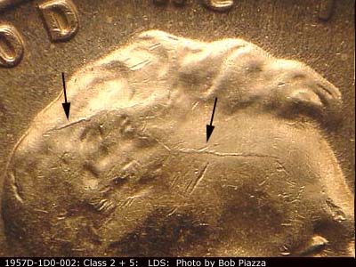 Die-stage C marker on 1957D•1DO•002 (1957 Doubled Die Obverse).
