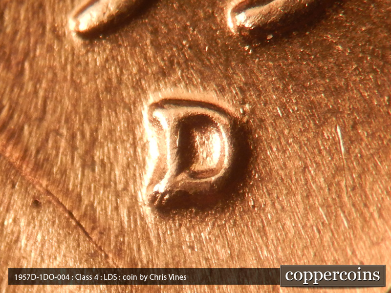 Die-stage C marker on 1957D•1DO•004 (1957 Doubled Die Obverse).