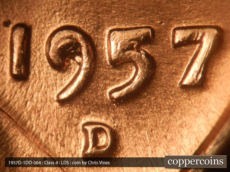 Die-stage C marker on 1957D•1DO•004 (1957 Doubled Die Obverse).