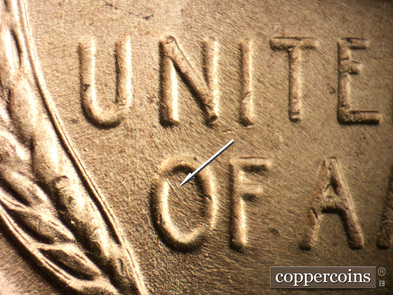 Die-stage B marker on 1957D•1DO•005 (1957 Doubled Die Obverse).