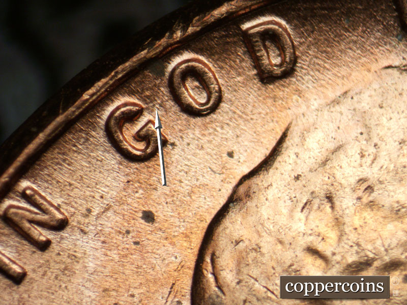 Die-stage A marker on 1957D•1DO•006 (1957 Doubled Die Obverse).