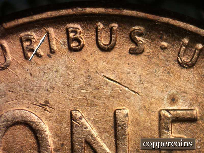 Die-stage A marker on 1957D•1DO•006 (1957 Doubled Die Obverse).