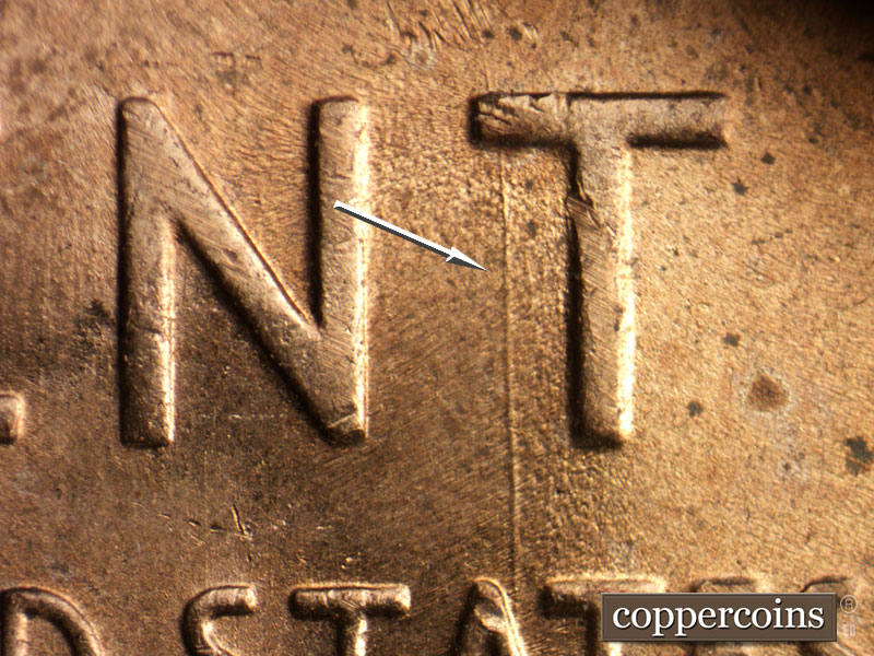 Die-stage A marker on 1957D•1DO•006 (1957 Doubled Die Obverse).