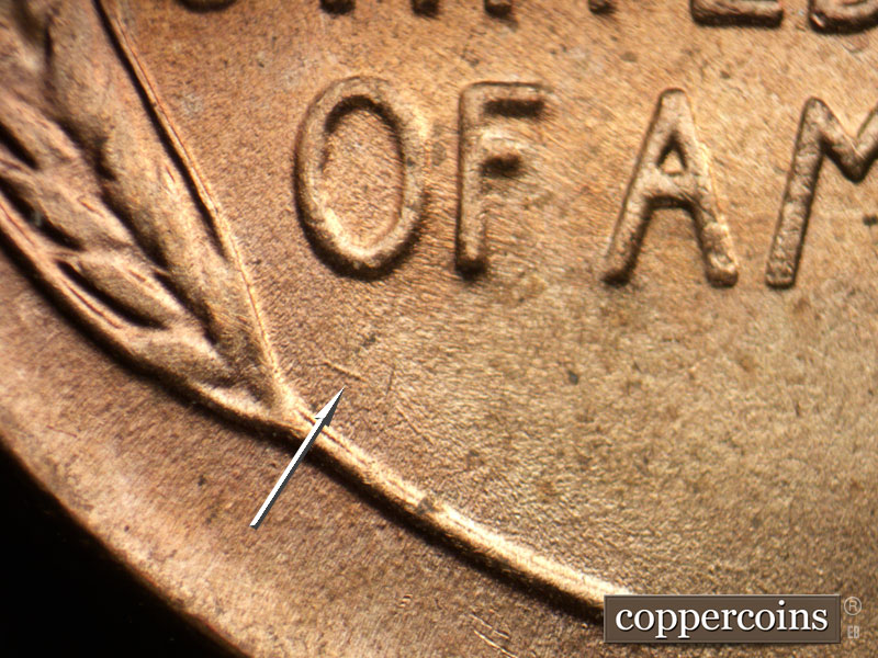 Die-stage A marker on 1957D•1DO•006 (1957 Doubled Die Obverse).