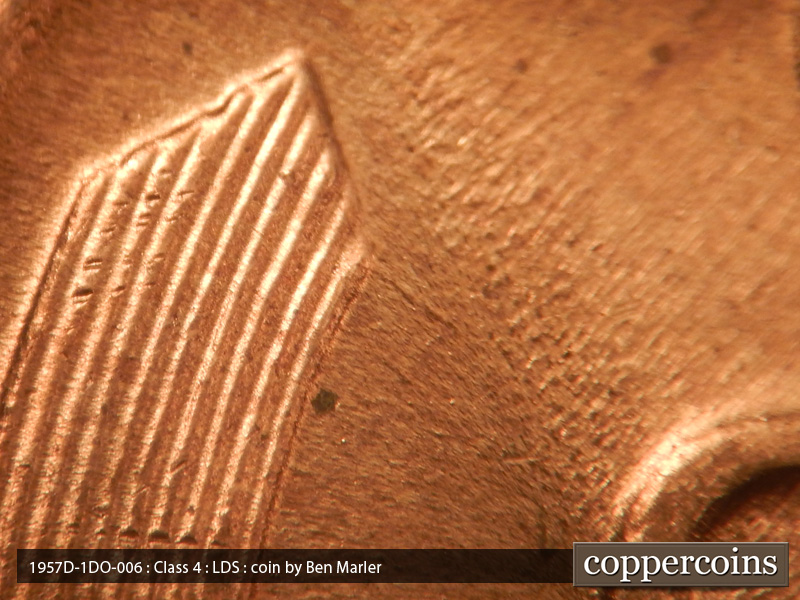 Die-stage C marker on 1957D•1DO•006 (1957 Doubled Die Obverse).