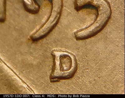 Die-stage B marker on 1957D•1DO•007 (1957 Doubled Die Obverse).