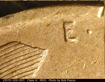 Die-stage B marker on 1957D•1DO•007 (1957 Doubled Die Obverse).