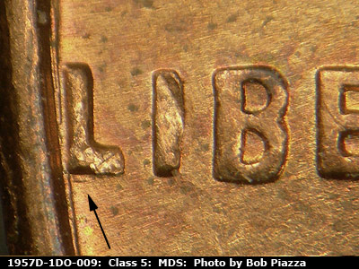 Die-stage B marker on 1957D•1DO•009 (1957 Doubled Die Obverse).