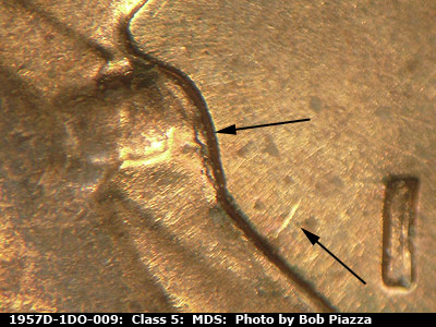 Die-stage B marker on 1957D•1DO•009 (1957 Doubled Die Obverse).