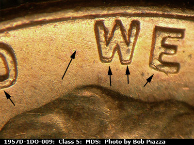 Die-stage B marker on 1957D•1DO•009 (1957 Doubled Die Obverse).