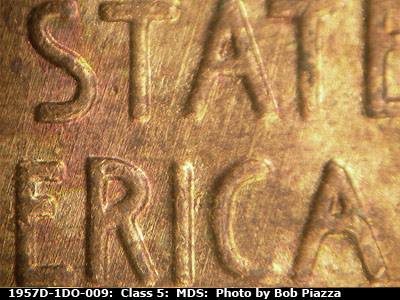 Die-stage B marker on 1957D•1DO•009 (1957 Doubled Die Obverse).