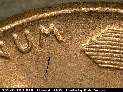 Die-stage B marker on 1957D•1DO•010 (1957 Doubled Die Obverse).