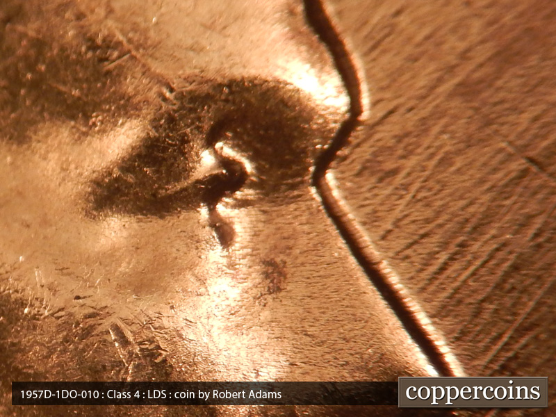 Die-stage C marker on 1957D•1DO•010 (1957 Doubled Die Obverse).