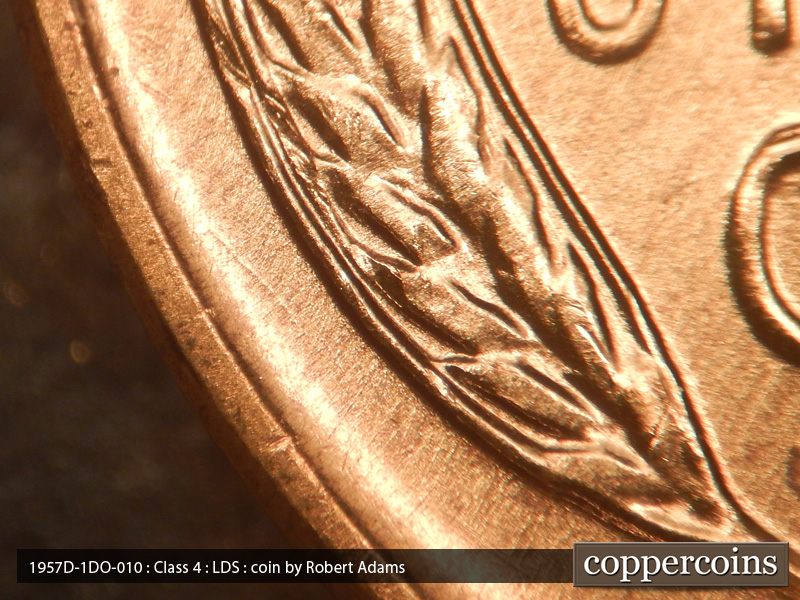 Die-stage C marker on 1957D•1DO•010 (1957 Doubled Die Obverse).