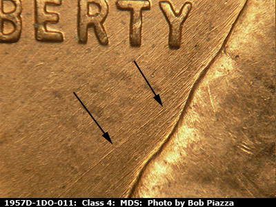 Die-stage B marker on 1957D•1DO•011 (1957 Doubled Die Obverse).