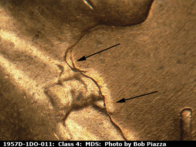 Die-stage B marker on 1957D•1DO•011 (1957 Doubled Die Obverse).