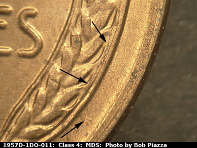 Die-stage B marker on 1957D•1DO•011 (1957 Doubled Die Obverse).