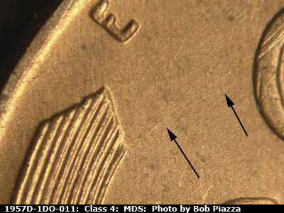 Die-stage B marker on 1957D•1DO•011 (1957 Doubled Die Obverse).