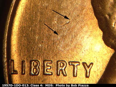 Die-stage B marker on 1957D•1DO•013 (1957 Doubled Die Obverse).