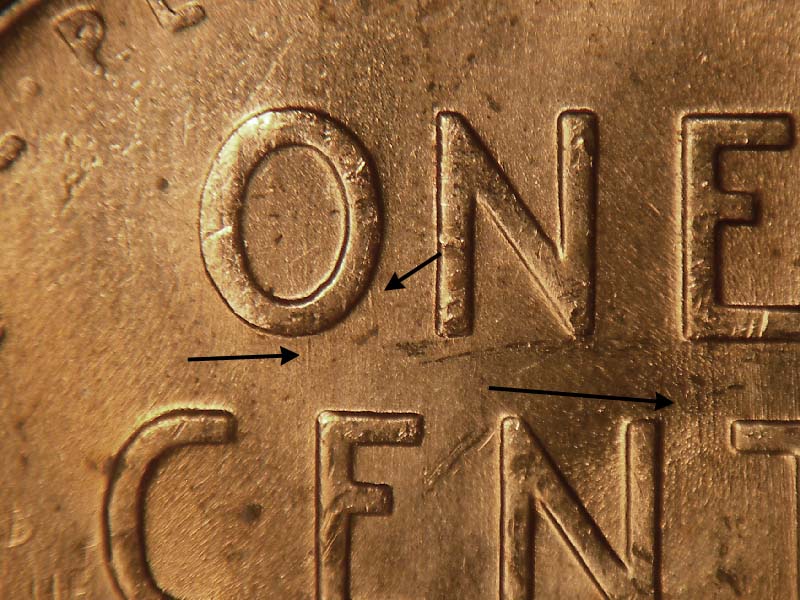 Die-stage B marker on 1957D•1DO•014 (1957 Doubled Die Obverse).