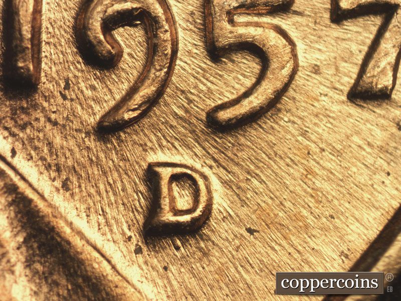 Die-stage C marker on 1957D•1DO•014 (1957 Doubled Die Obverse).