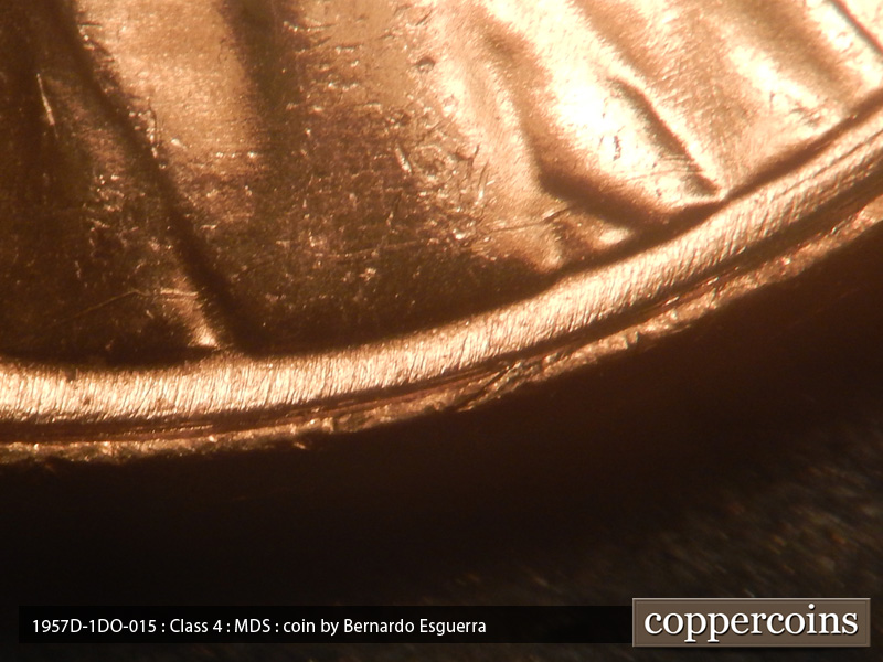 Die-stage B marker on 1957D•1DO•015 (1957 Doubled Die Obverse).