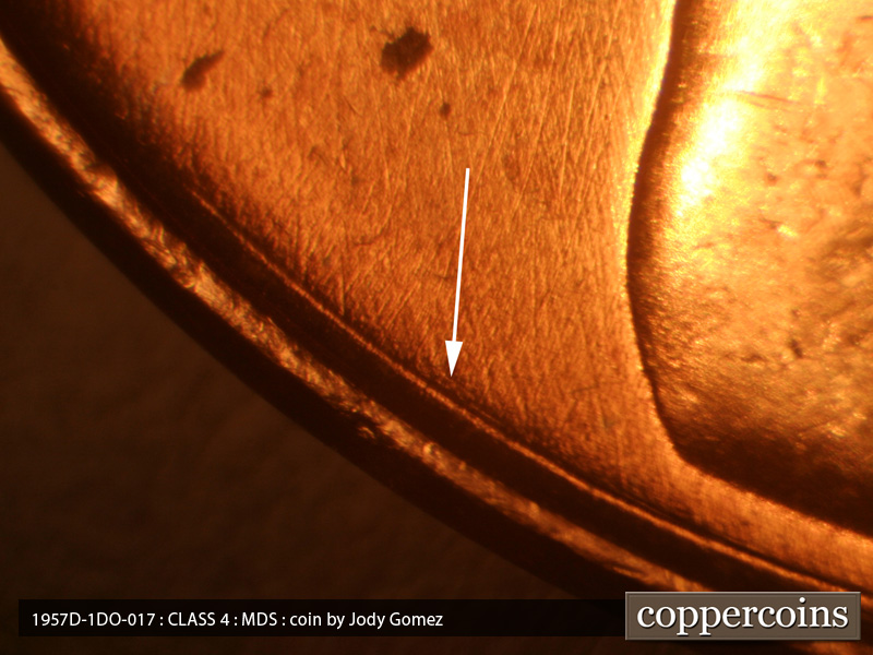 Die-stage B marker on 1957D•1DO•017 (1957 Doubled Die Obverse).