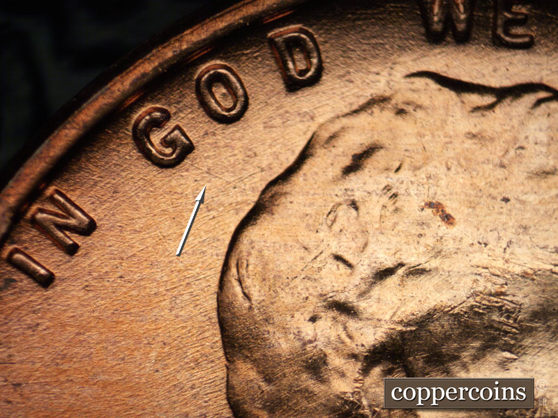 Die-stage B marker on 1957D•1DO•018 (1957 Doubled Die Obverse).