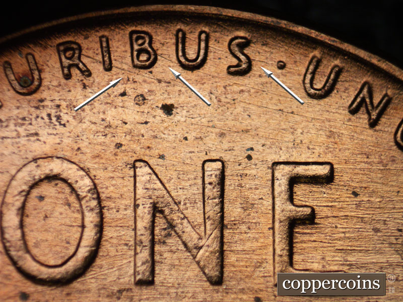 Die-stage B marker on 1957D•1DO•018 (1957 Doubled Die Obverse).