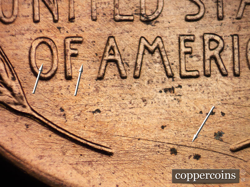 Die-stage B marker on 1957D•1DO•018 (1957 Doubled Die Obverse).