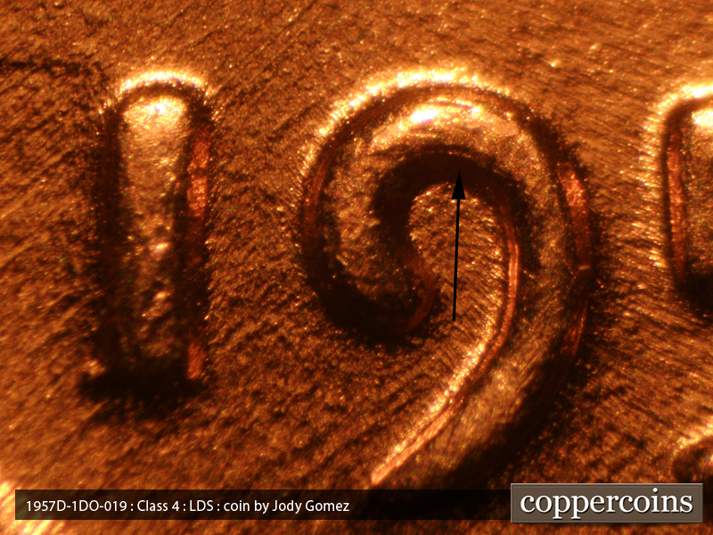 Die-stage C marker on 1957D•1DO•019 (1957 Doubled Die Obverse).
