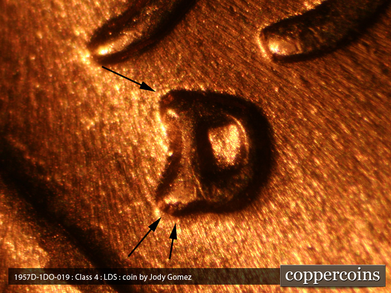 Die-stage C marker on 1957D•1DO•019 (1957 Doubled Die Obverse).