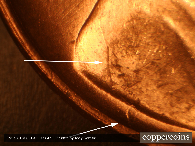 Die-stage C marker on 1957D•1DO•019 (1957 Doubled Die Obverse).