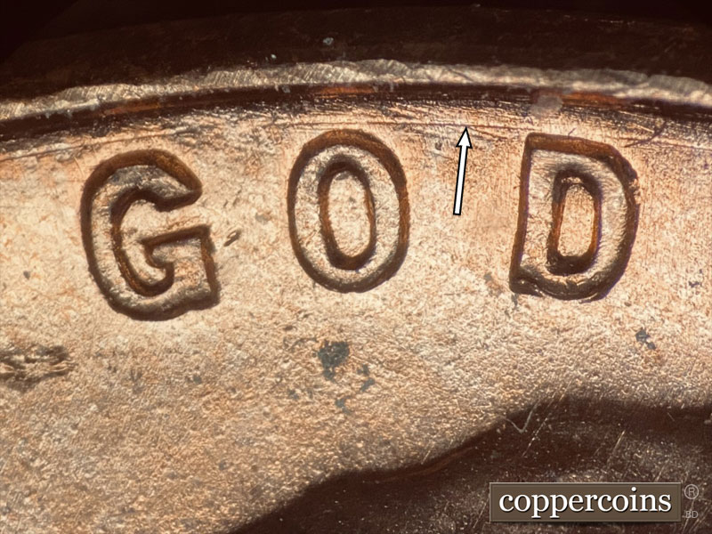 Die-stage B marker on 1957D•1DO•021 (1957 Doubled Die Obverse).