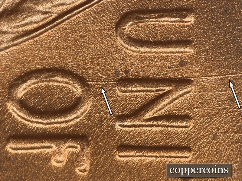 Die-stage B marker on 1957D•1DO•021 (1957 Doubled Die Obverse).