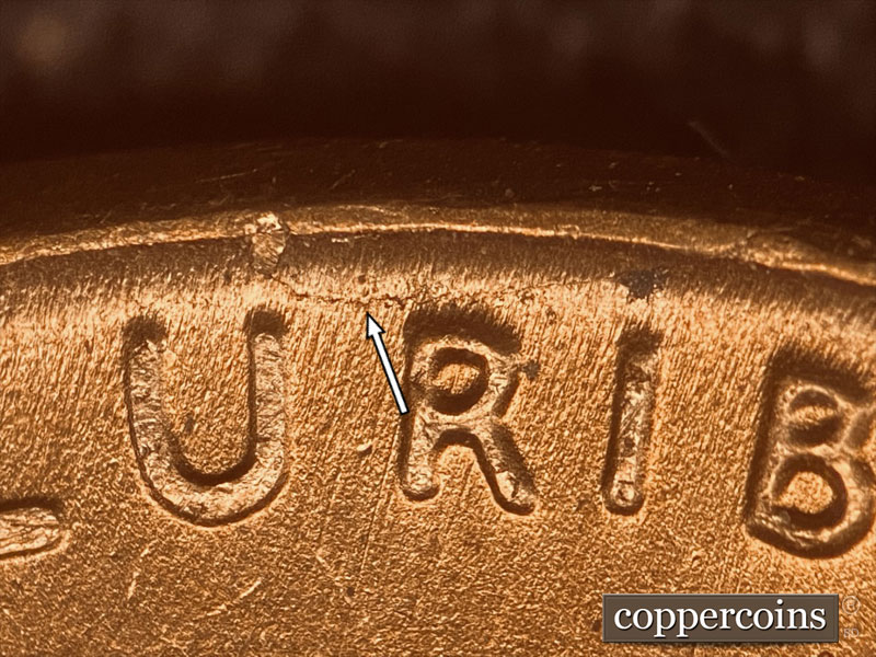 Die-stage B marker on 1957D•1DO•021 (1957 Doubled Die Obverse).