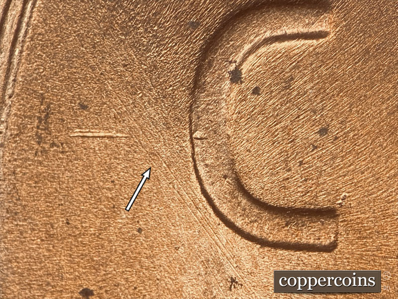 Die-stage B marker on 1957D•1DO•021 (1957 Doubled Die Obverse).