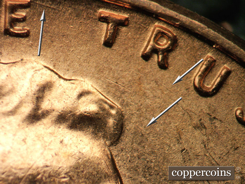 Die-stage B marker on 1957D•1DO•022 (1957 Doubled Die Obverse).