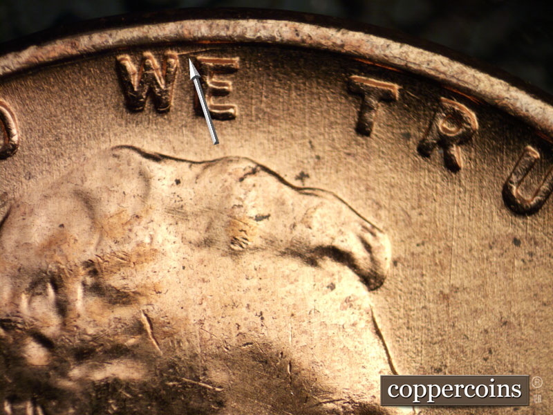 Die-stage B marker on 1957D•1DO•023 (1957 Doubled Die Obverse).