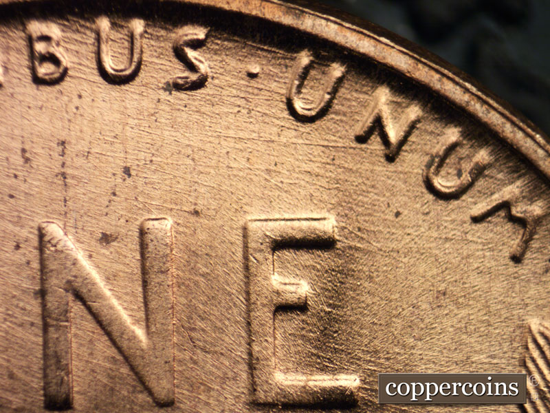 Die-stage B marker on 1957D•1DO•023 (1957 Doubled Die Obverse).