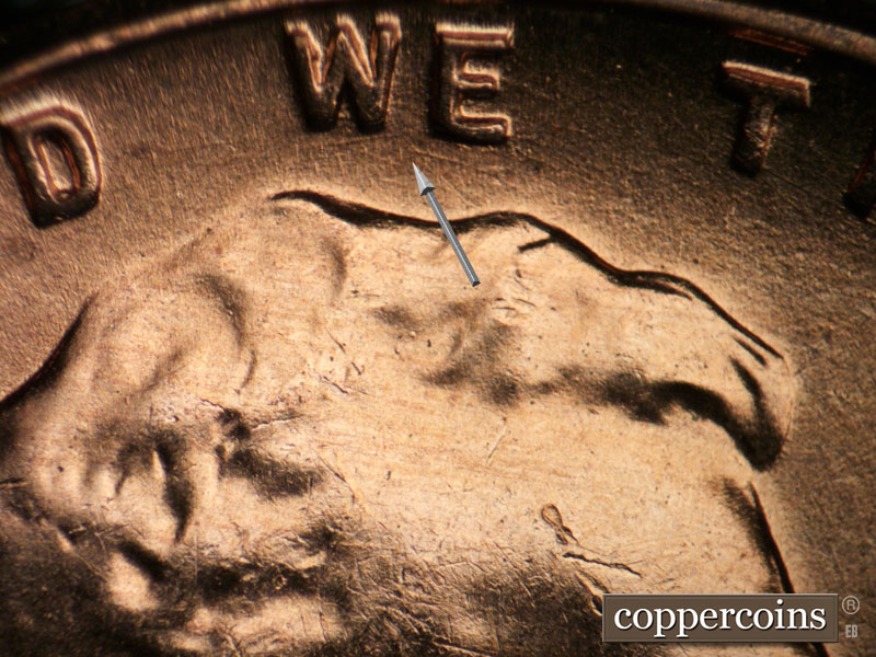 Die-stage B marker on 1957D•1DO•024 (1957 Doubled Die Obverse).