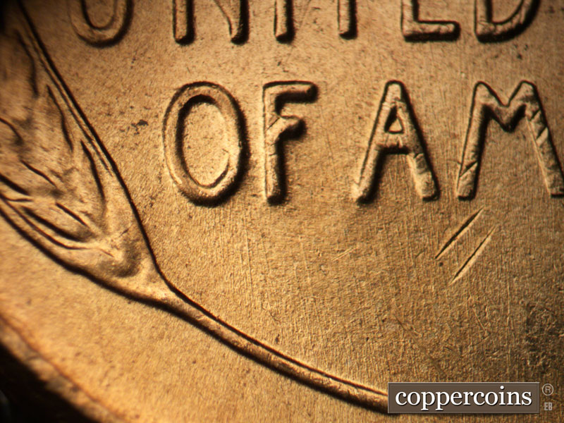 Die-stage B marker on 1957D•1DO•025 (1957 Doubled Die Obverse).