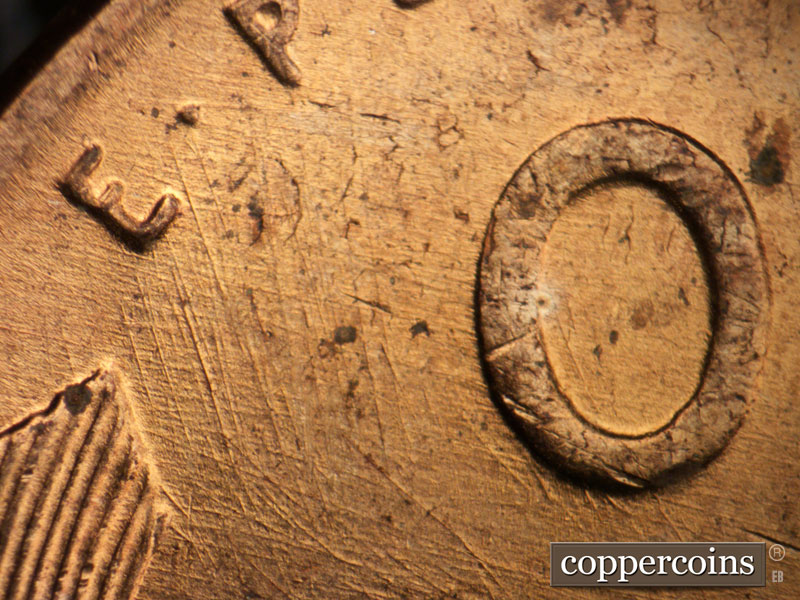Die-stage B marker on 1957D•1DO•026 (1957 Doubled Die Obverse).