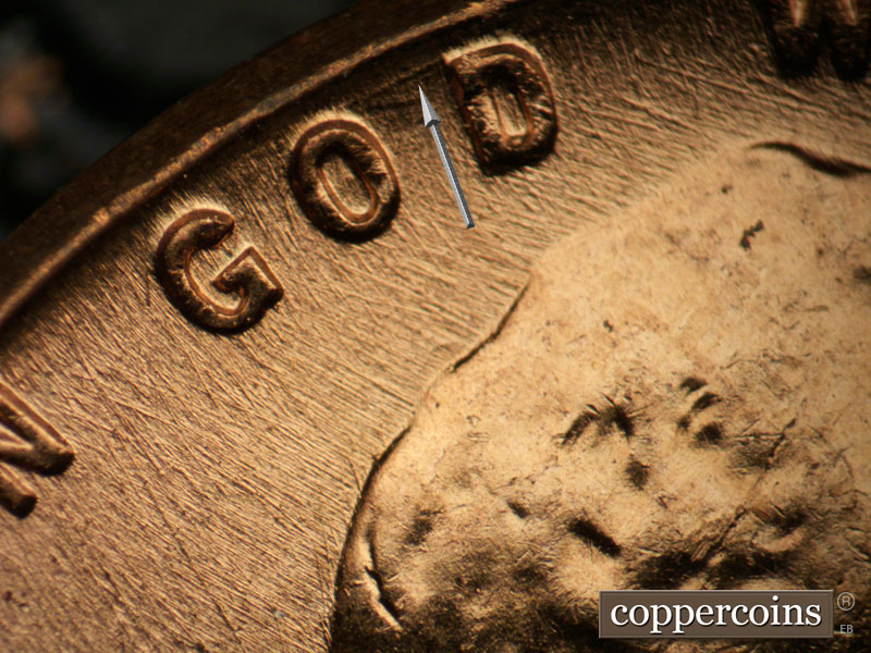 Die-stage B marker on 1957D•1DO•028 (1957 Doubled Die Obverse).