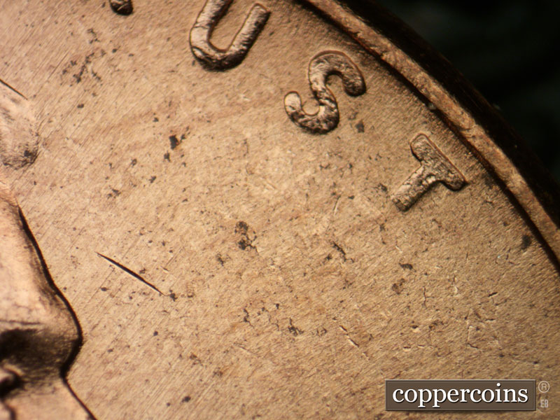 Die-stage B marker on 1957D•1DO•029 (1957 Doubled Die Obverse).